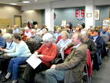 Council Chambers were packed for John Reid's presentation.
